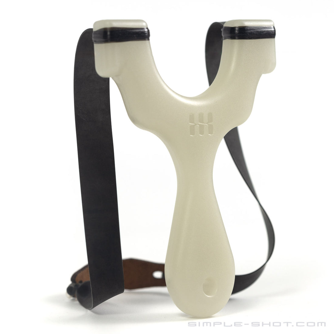 A glow in the dark Y-shaped Axiom Champ Slingshot with black rubber bands is displayed against a white background. The thin handle complements the compact design, and the bands are securely attached to the prongs.